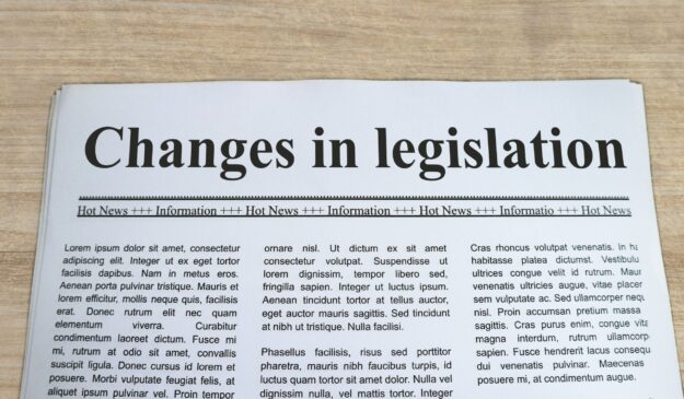 A,Newspaper,With,The,Headline,Changes,In,Legislation